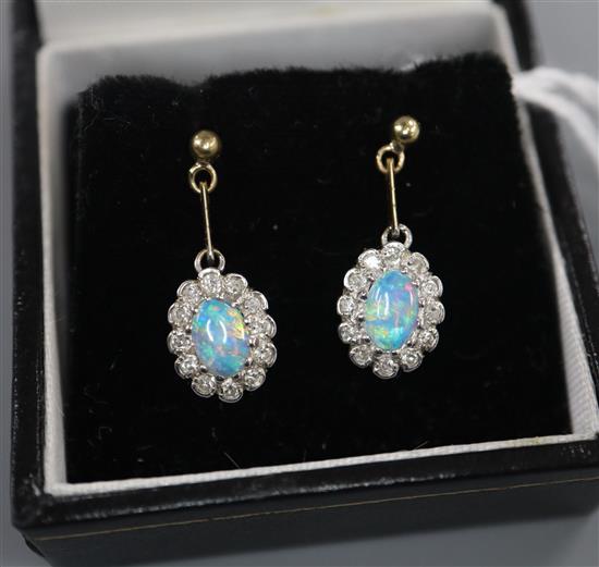 A pair of 9ct, black opal and diamond set oval cluster drop earrings, drop 18mm.